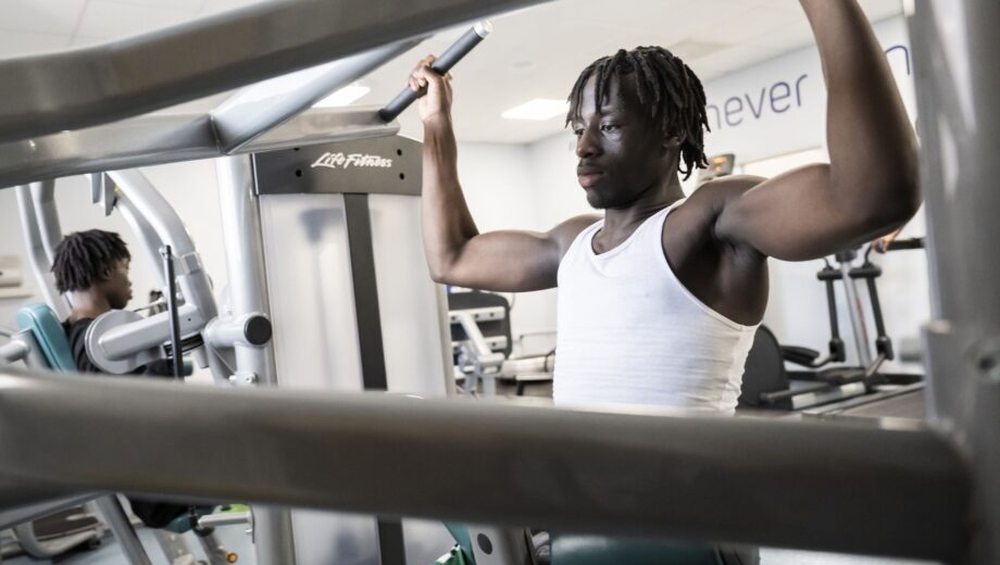 Student using gym equiptment